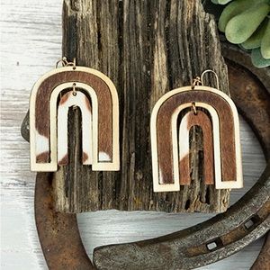 Brown cow wood earrings